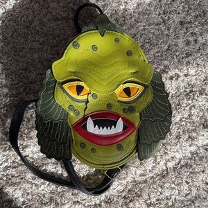 Love pain and stitches creature Backpack